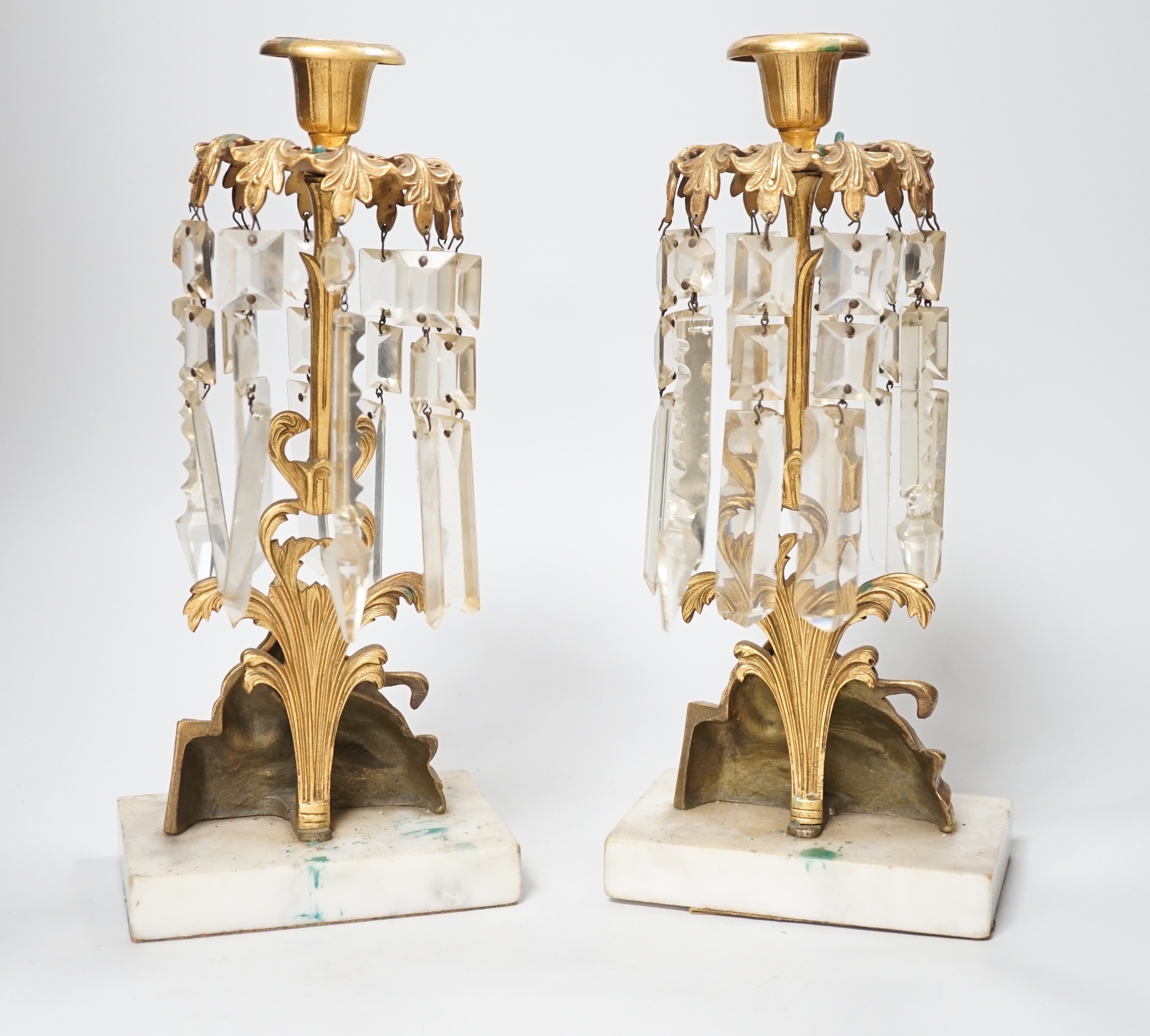 A pair of figural gilt metal table candlestick lustres on marble bases. 30cm tall